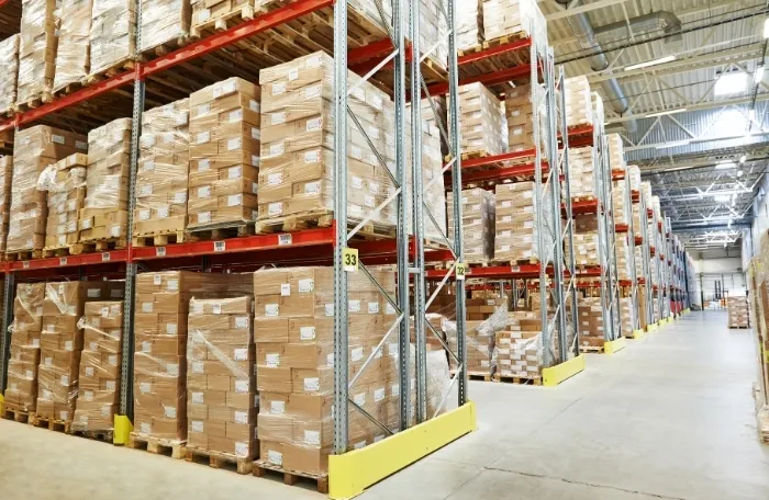For warehouses Warehouse supervisor reviewing inventory in a New Jersey facility